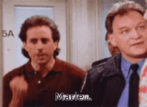 two men are standing next to each other and one of them is saying " marie "