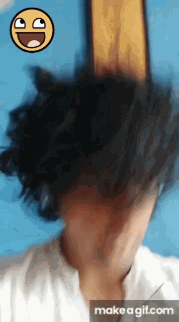 a gif of a person with a smiley face on their face