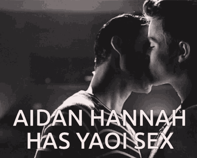 a black and white photo of two men kissing with the words aidan hannah has yaoi sex below them
