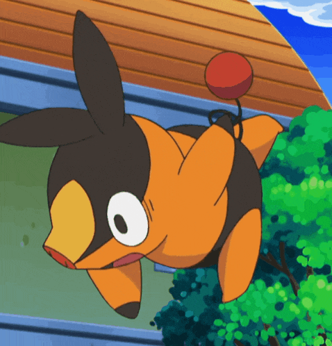 an orange and black cartoon character with a red ball on its back