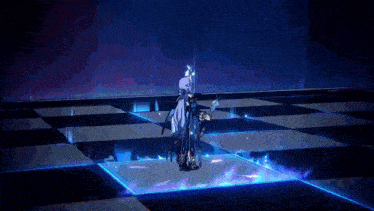 a person is standing in a dark room with a blue light coming out of it