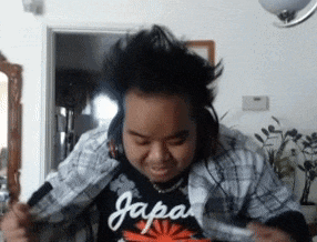 a person wearing a shirt that says japan