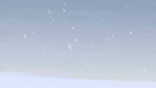 a bird is flying over a snowy field in the sky .