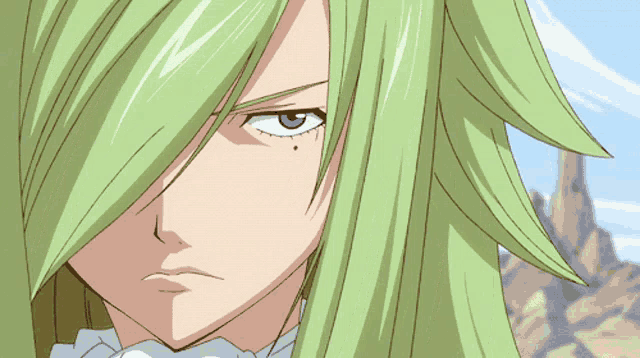 a close up of a cartoon character with green hair