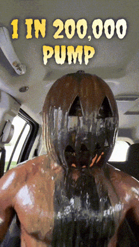 a man in a car with a pumpkin on his head and the words 1 in 200,000 pump above him