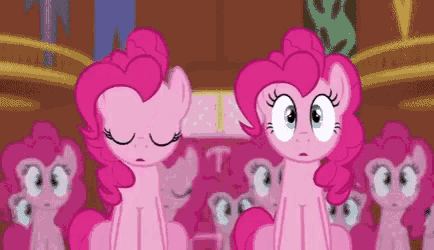 pinkie pie is standing in front of a group of pink ponies .