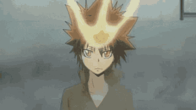 a close up of a person 's head with a fireball on it