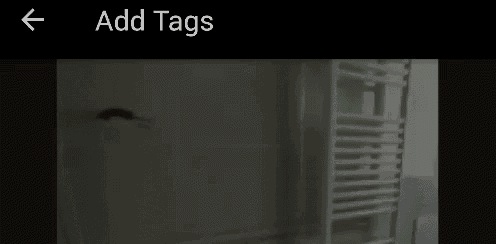 a black and white photo of a towel rack with the words add tags on the bottom