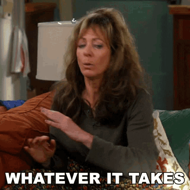 a woman sitting on a couch with the words whatever it takes written below her