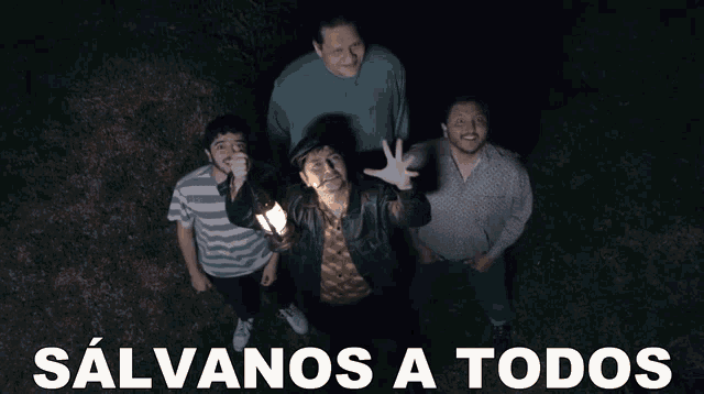 a group of men standing next to each other with the words salvanos a todos written below them