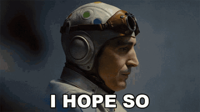 a man wearing a helmet and goggles with the words i hope so above him