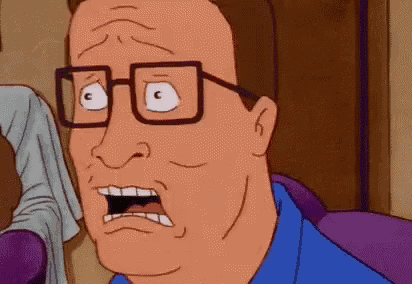 a cartoon man wearing glasses and a blue shirt is making a funny face .
