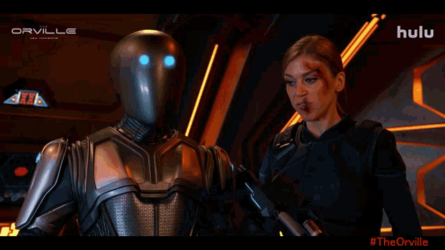 a woman with a bloody face is on a screen that says orville