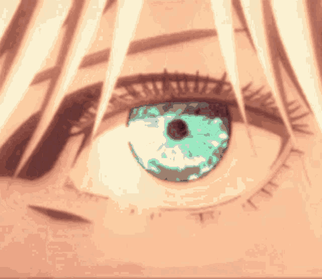 a close up of a person 's eye with a blue pupil .
