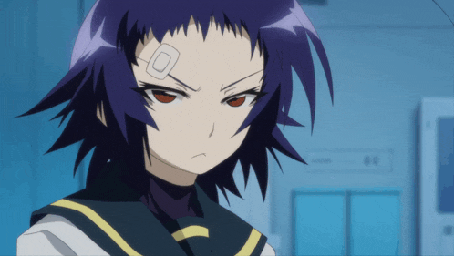 a girl with purple hair has a patch on her forehead