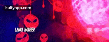 a purple and red background with the name laura harrier at the bottom