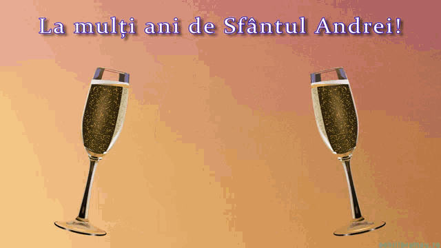 la multi ani de sfantul andrei is written above two champagne glasses