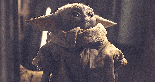 a stuffed animal with a scarf around its neck