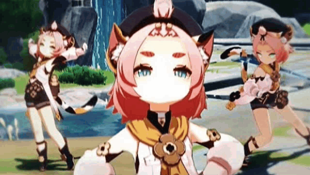 a girl in a cat costume is standing next to a waterfall .