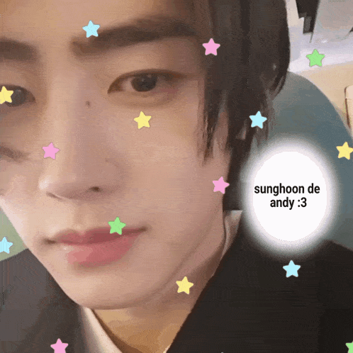 a close up of a person 's face with stars and the words sunghoon de andy 3