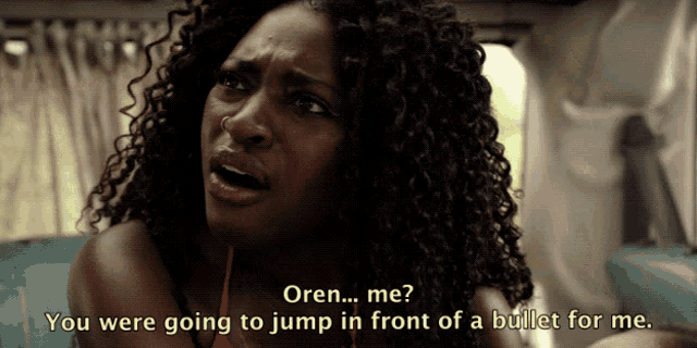 a woman with curly hair says " oren ... me "