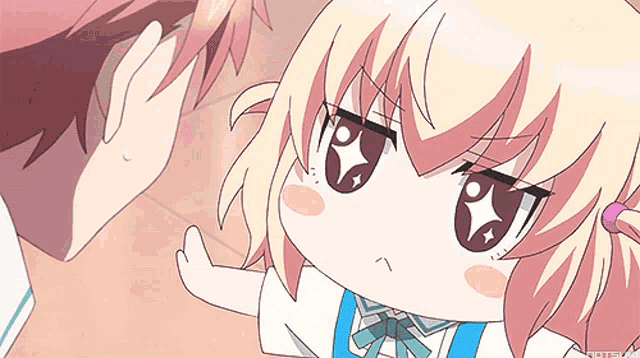 a boy and girl are looking at each other and the girl is making a face
