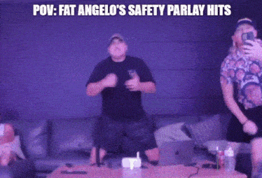 two men are dancing in front of a purple wall with the words pov fat angelo 's safety parlay hits