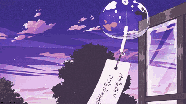 a wind chime with a tag that says " i love you "