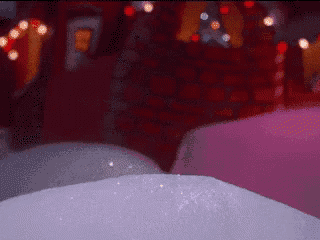 a blurred image of a room with a christmas tree and candy canes