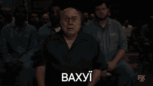 a man with a surprised look on his face and the word baxyi on the bottom