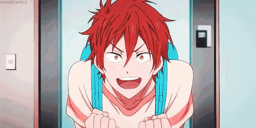 a boy with red hair is standing in front of an elevator with a backpack on his back .