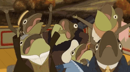 a group of frogs with their mouths open are standing together