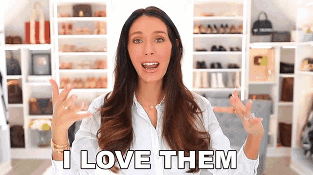 a woman says i love them in front of a closet full of shoes