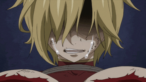 a close up of a person 's face with a tear coming out of it