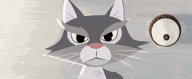 a cartoon cat has a very angry look on its face
