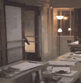 a desk with papers and a cup that says coffee on it