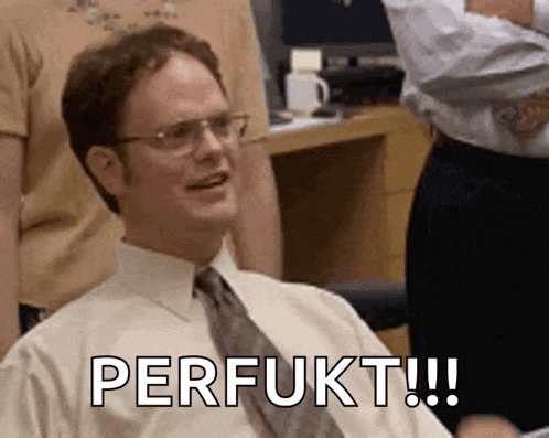 a man wearing glasses and a tie is sitting in a chair with the words perfukt written on his face .