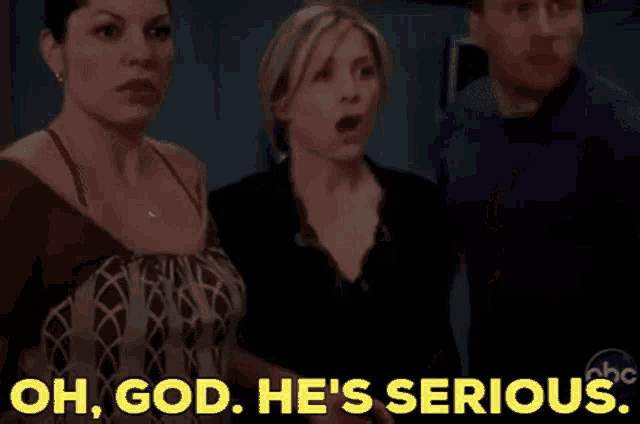 a group of people standing next to each other with the words oh god he 's serious in yellow