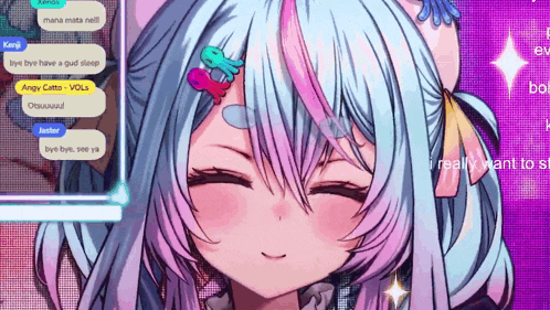 a girl with blue hair is smiling and talking to a group of people