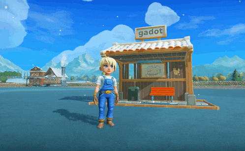 a girl in overalls stands in front of a building that says gadot