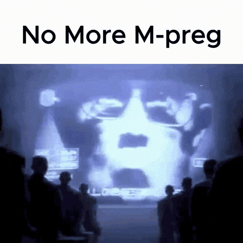 a group of people are looking at a screen that says no more m-preg