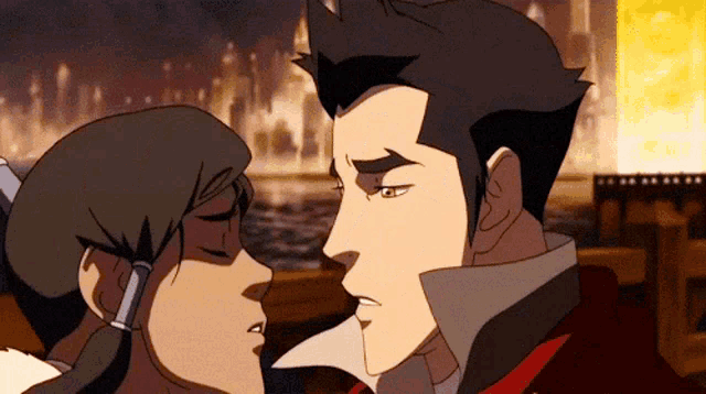 a man and a woman are looking at each other