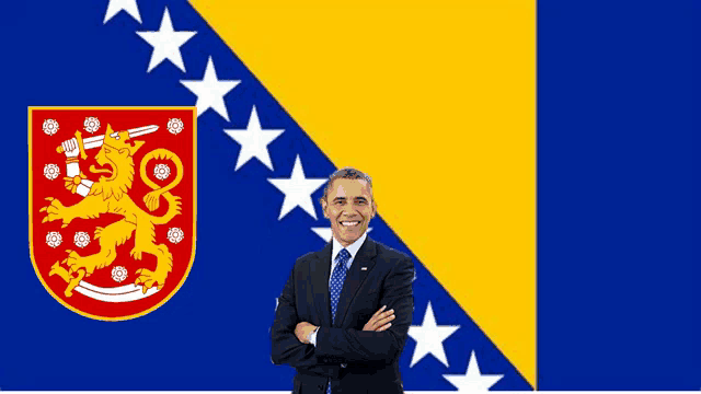 a man standing in front of a flag with a coat of arms on it