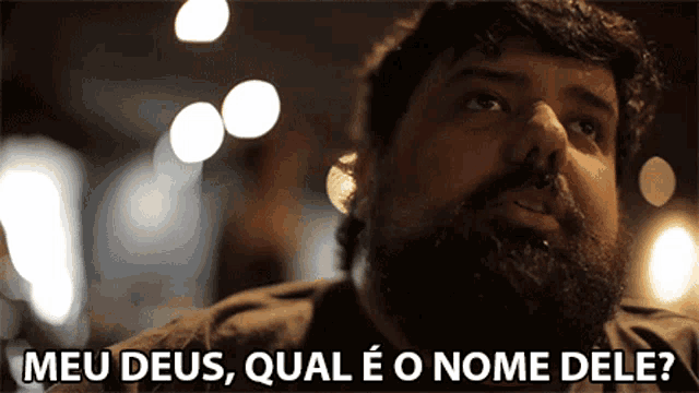 a man with a beard says meu deus qual eo nome dele