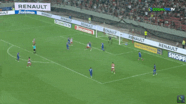 a soccer game is being played in a stadium with advertisements for renault