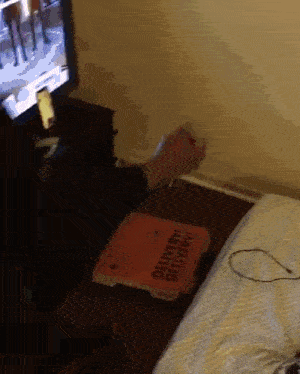 a pizza box that says delivery delivery sits on a table