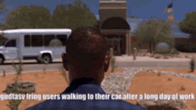 a man walking to their car after a long day of work with a bus in the background