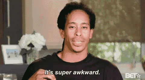 a man in a black shirt is saying `` it 's super awkward . ''