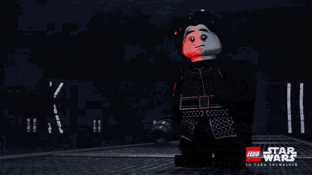 a lego star wars character holding a red light sword