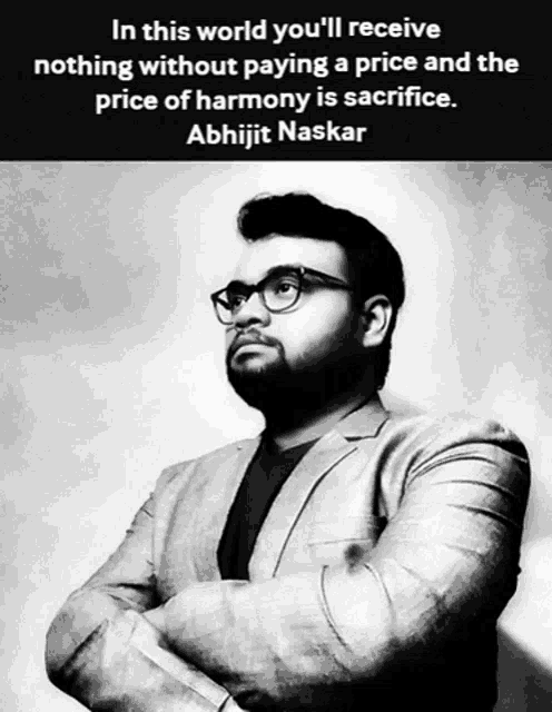 a black and white photo of a man with a quote by abhijit naskar on the bottom